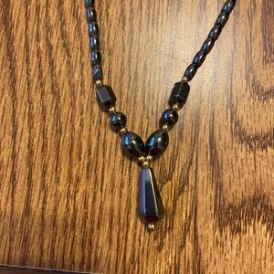 Black Diamond like necklace.